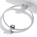 Mosómedve ezüst charm