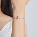Ezust-hoember-charm-csikos-sallal
