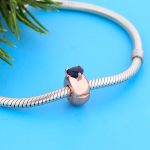 Rosegold-szinu-spacer-kek-szivvel-ezust-charm