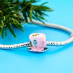 Rozsaszin-teas-csesze-ezust-charm