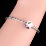 Rozsaszin-teas-csesze-ezust-charm