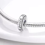Peace feliratos Stopper szilikonos ezüstözött charm 1 db