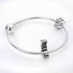 Hopehely-mintas-ezust-gomb-charm