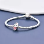 Ezüstözött nővérke charm