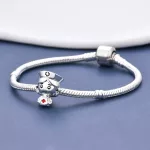 Ezüstözött nővérke charm
