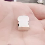 Ezüstözött fülhallgató tok charm