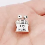 Ezüstözött fülhallgató tok charm