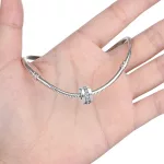 Elegans-Nyithato-ezust-charm-ko-berakasokkal