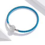 Türkiz bőr karkötő ezüs zárral hópehely motívummal 19 cm