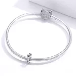 Hullamos-viragos-ezust-spacer-medal-karkotore