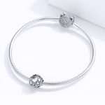 Áttört szíves pöttyös ezüst gömb charm