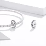 Szikrázó csavart vonalak ezüst charm