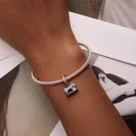 Varrogep-ezust-fuggo-charm