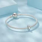 Éjféli Ragyogás ezüst stopper charm