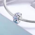 Lila virágos ezüst charm spacer