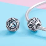 L-Betu-Koves-diszer-ezust-gomb-charm