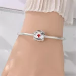 Hopehely-mintas-ezust-gomb-charm